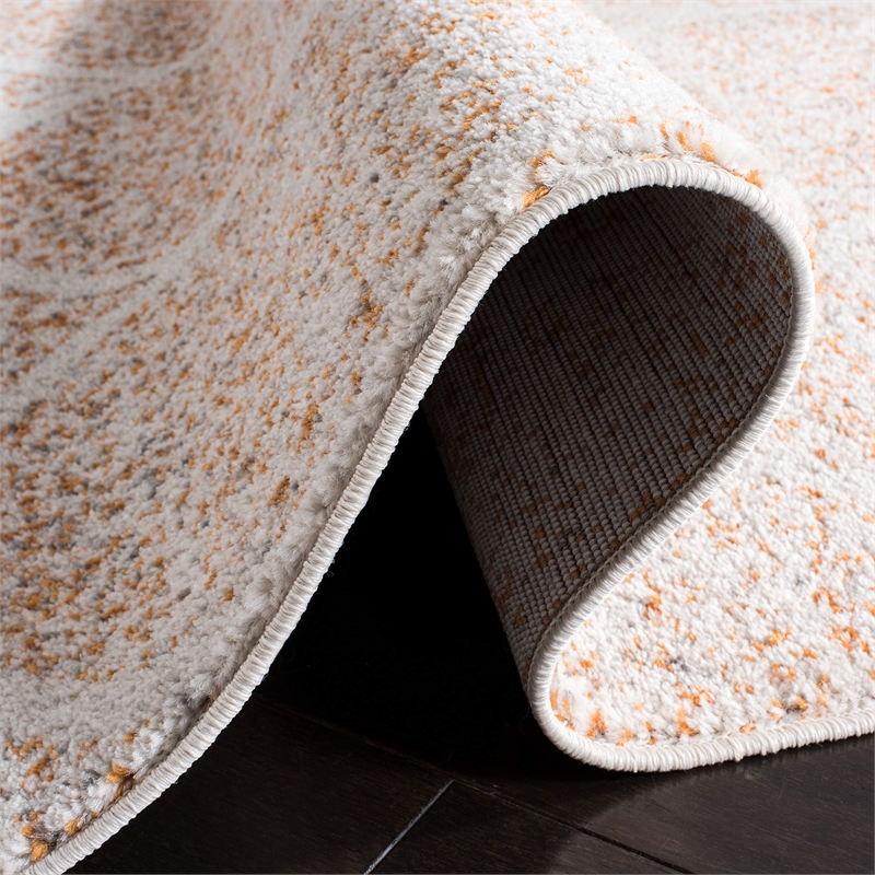 Safavieh Madison 4' x 6' Rug in Orange and Ivory