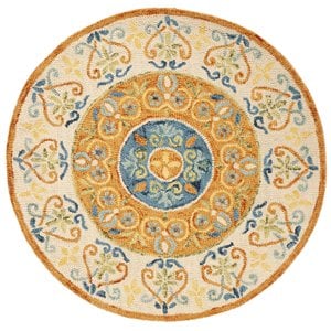 Safavieh Novelty 4' Round Hand Tufted Wool Rug in Gold and Ivory