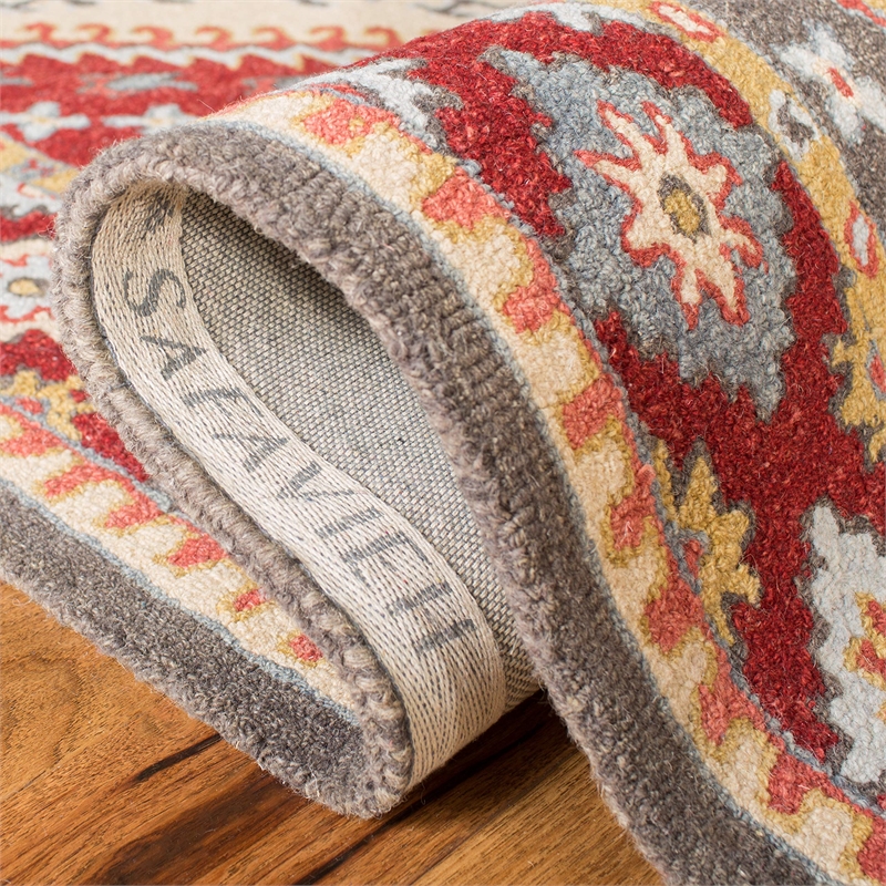Safavieh Aspen 4' x 6' Hand Tufted Wool Rug in Red and Ivory