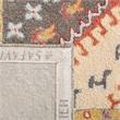 Safavieh Aspen 4' x 6' Hand Tufted Wool Rug in Red and Ivory