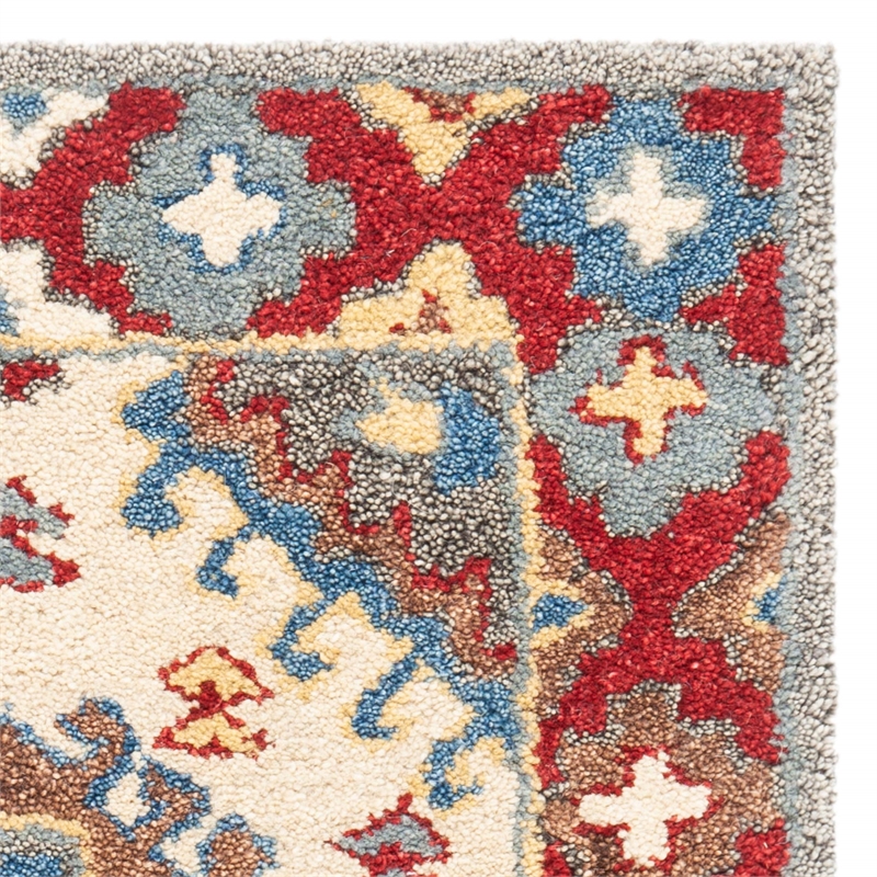 Safavieh Antiquity 2' x 3' Hand Tufted Wool Rug in Red and Ivory