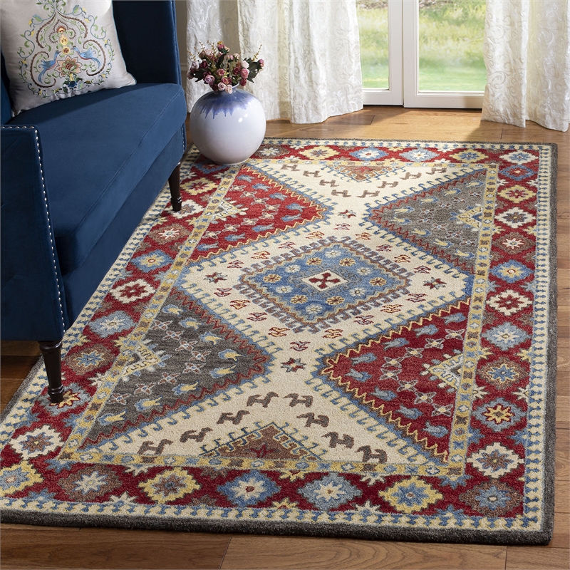 Safavieh Antiquity 5' x 8' Hand Tufted Wool Rug in Red and Ivory