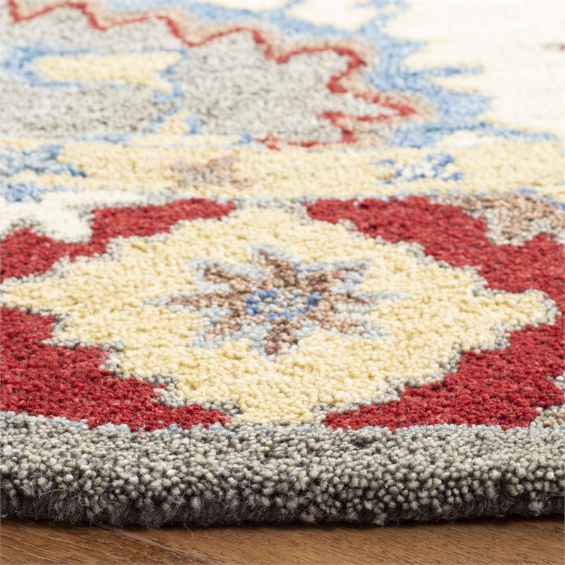 Safavieh Antiquity 6' Round Hand Tufted Wool Rug in Red and Ivory