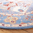 Safavieh Antiquity 6' Round Hand Tufted Wool Rug in Blue and Red