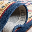 Safavieh Heritage 6' Round Hand Tufted Wool Rug in Navy and Ivory