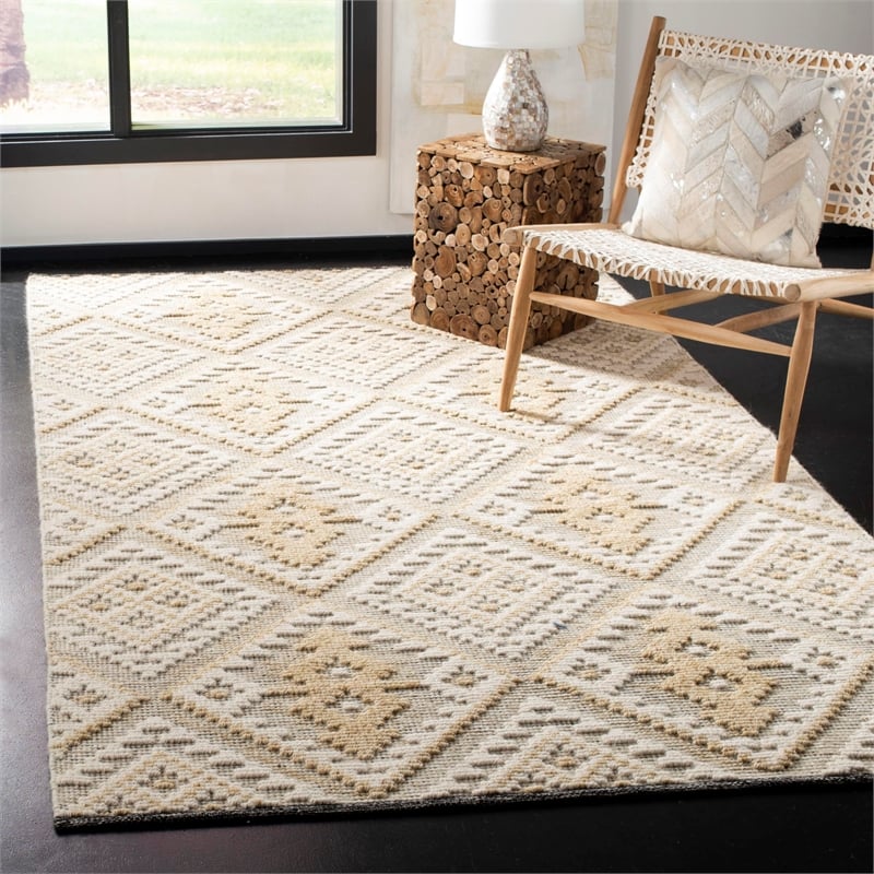 Safavieh Kenya 6' x 9' Hand Knotted Shag Wool Rug in Ivory and Gold