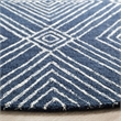 Safavieh Micro-Loop 5' Round Hand Tufted Wool Rug in Navy and Ivory