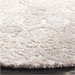 Safavieh Marquee 6' Round Hand Tufted Wool Rug in Beige and Ivory