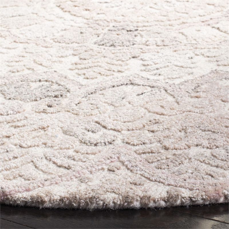 Safavieh Marquee 6' Round Hand Tufted Wool Rug in Beige and Ivory