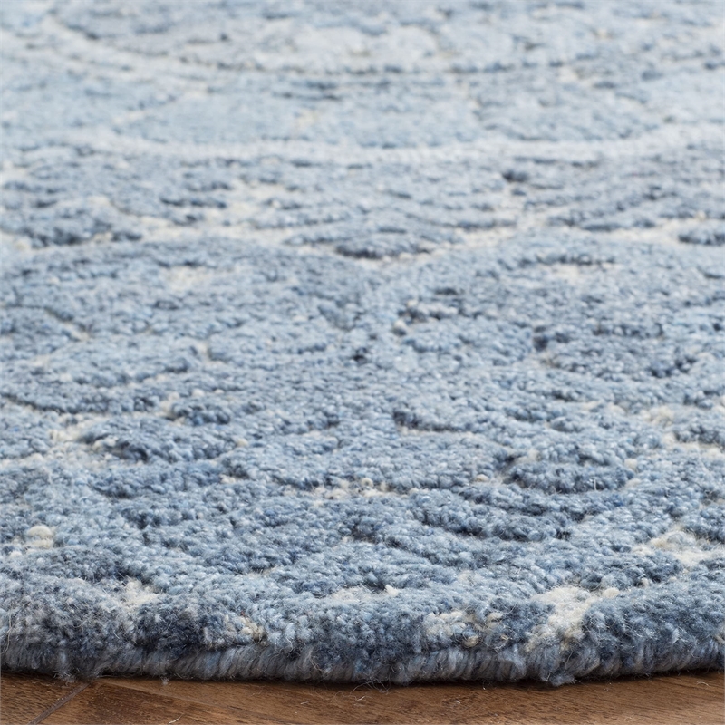 Safavieh Marquee 6' Round Hand Tufted Wool Rug in Blue and Ivory