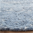 Safavieh Marquee 6' Round Hand Tufted Wool Rug in Blue and Ivory