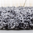 Safavieh Rio 6' x 9' Hand Loomed Shag Rug in Black and Ivory