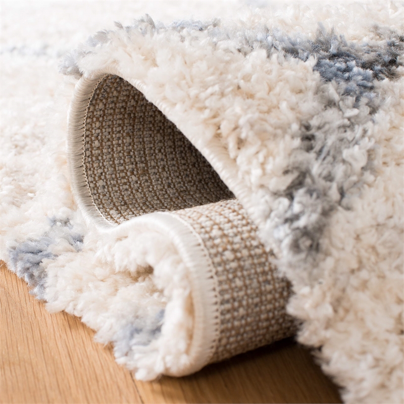 Safavieh Berber 9' x 12' Shag Rug in Cream and Gray