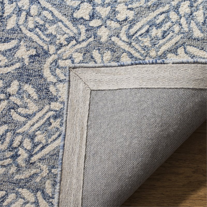 Safavieh Micro-Loop 8' x 10' Hand Tufted Wool Rug in Blue and Ivory