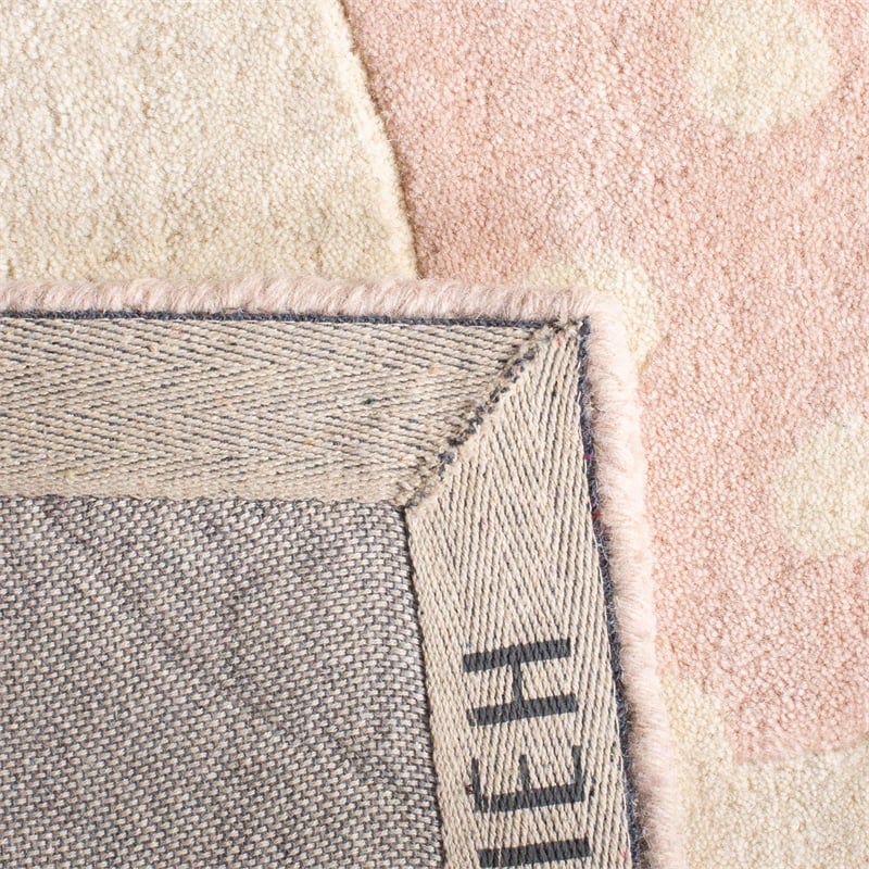 Safavieh 8' x 10' Hand Tufted Wool Rug in Pink and Ivory
