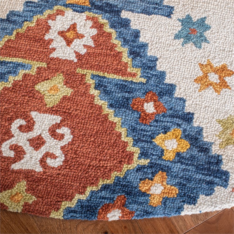 Safavieh Aspen 7' Round Hand Tufted Wool Rug in Ivory and Blue