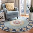 Safavieh Blossom 6' Round Hand Tufted Wool Rug in Blue and Gold