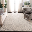 Safavieh Dip Dye 3' x 5' Hand Tufted Wool Rug in Blue and Ivory
