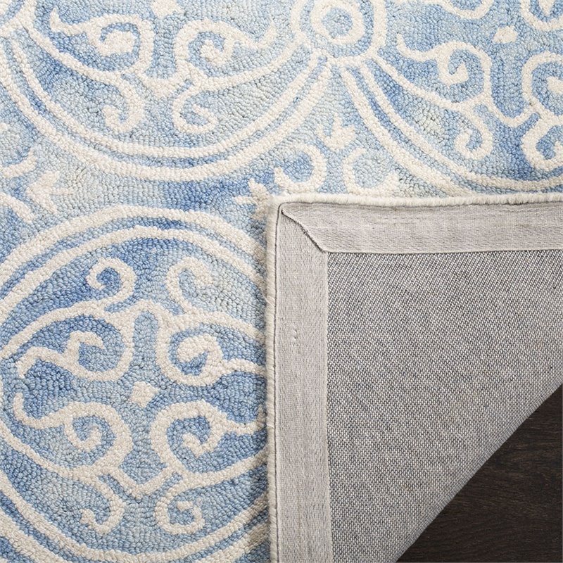 Safavieh Dip Dye 4' x 6' Hand Tufted Wool Rug in Blue and Ivory