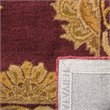 Safavieh Heritage 5' x 8' Hand Tufted Wool Rug in Maroon