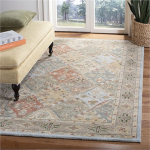 Safavieh Heritage 4' x 6' Hand Tufted Wool Rug in Light Blue and Light Brown