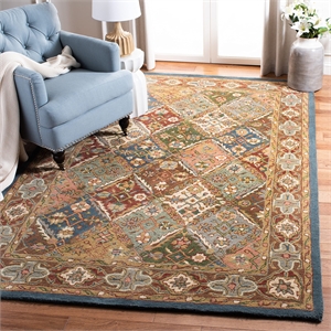 Safavieh Heritage 4' x 6' Traditional Hand Tufted Wool Rug in Green and Red