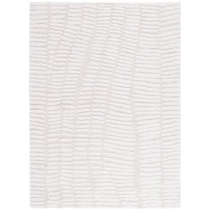 Safavieh Rumi Shag 6'-0&quot x 9'-0&quot Polyester Power Loomed Rug in Ivory /  Beige