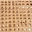 Baxton Studio Caspia Walnut Brown Finished Wood and Natural Rattan Counter Stool