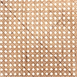 Baxton Studio Palesa Two-Tone Black and Brown Rattan Dining Chair