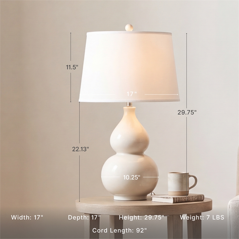 Signature Design by Ashley Saffi Ceramic Table Lamp in Cream