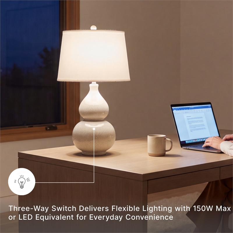 Signature Design by Ashley Saffi Ceramic Table Lamp in Cream
