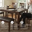 Signature Design by Ashley Bennox 6-Piece Engineered Wood Dining Set in Brown