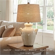 Signature Design by Ashley Emelda Ceramic Table Lamp in Cream