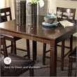 Ashley Furniture Bennox 5 Piece Counter Height Dining Set in Brown