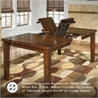 Signature Design by Ashley Ralene Butterfly Dining Table in Medium Brown