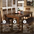 Signature Design by Ashley Ralene Butterfly Dining Table in Medium Brown