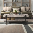 Furniture of America Acres Wood Natural Coffee Table with Metal Black Wheels
