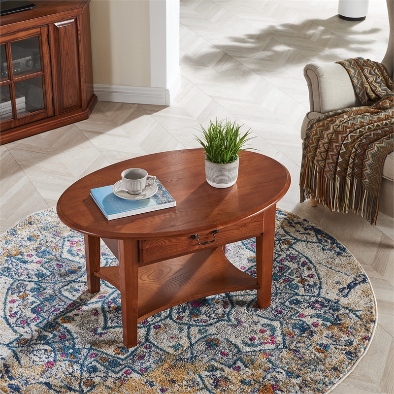 Bowery Hill Shaker Oval Coffee Table in Medium Oak Finish