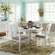 Bowery Hill Wood Round Pedestal Dining Table in White