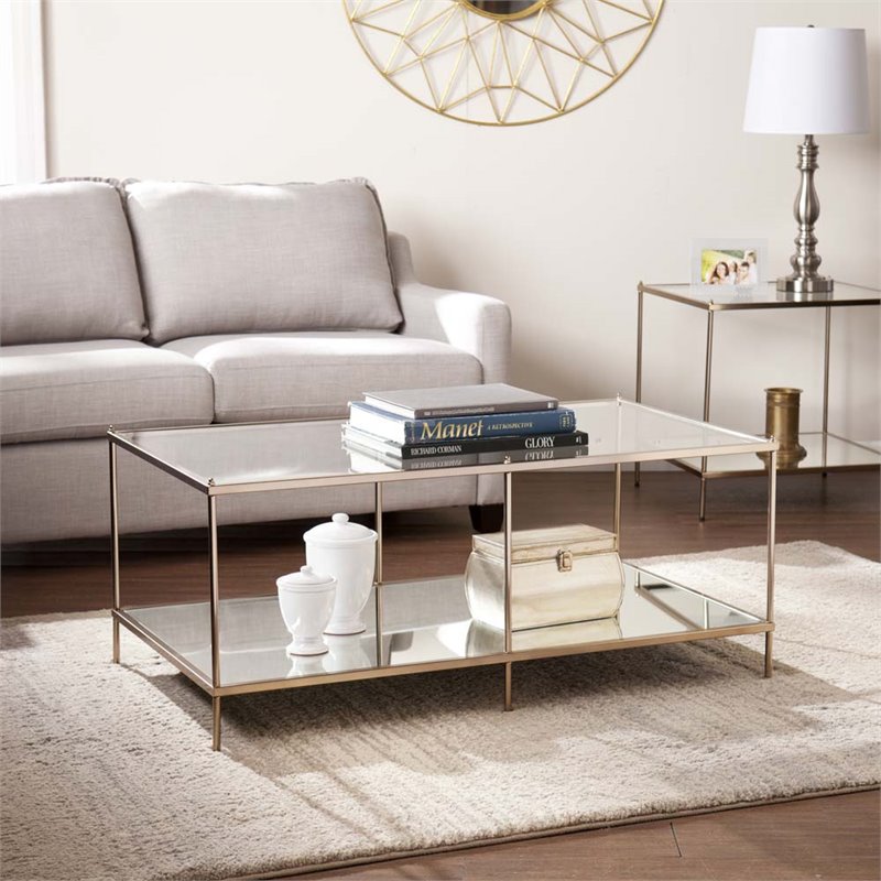 Bowery Hill Glass Top Coffee Table in Gold