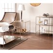 Bowery Hill Glass Top Coffee Table in Gold