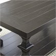 Bowery Hill Wood Coffee Table with Planked Top and Pedestal Base in Ebony