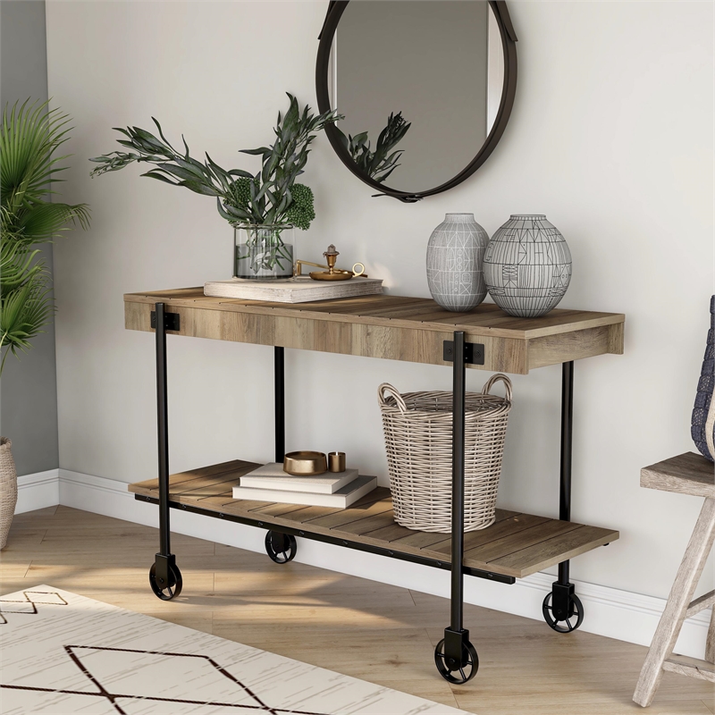 Bowery Hill Oak Console Table with Metal Black Wheels Finish