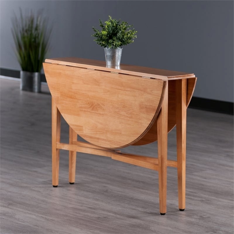 Bowery Hill Round Drop Leaf Contemporary Solid Wood Dining Table in Light Oak