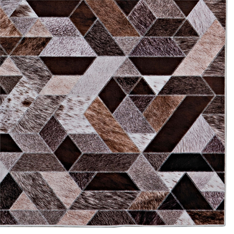 Bowery Hill Patchwork Polyester Faux Cowhide 5' X 7' Area Rug in Brown