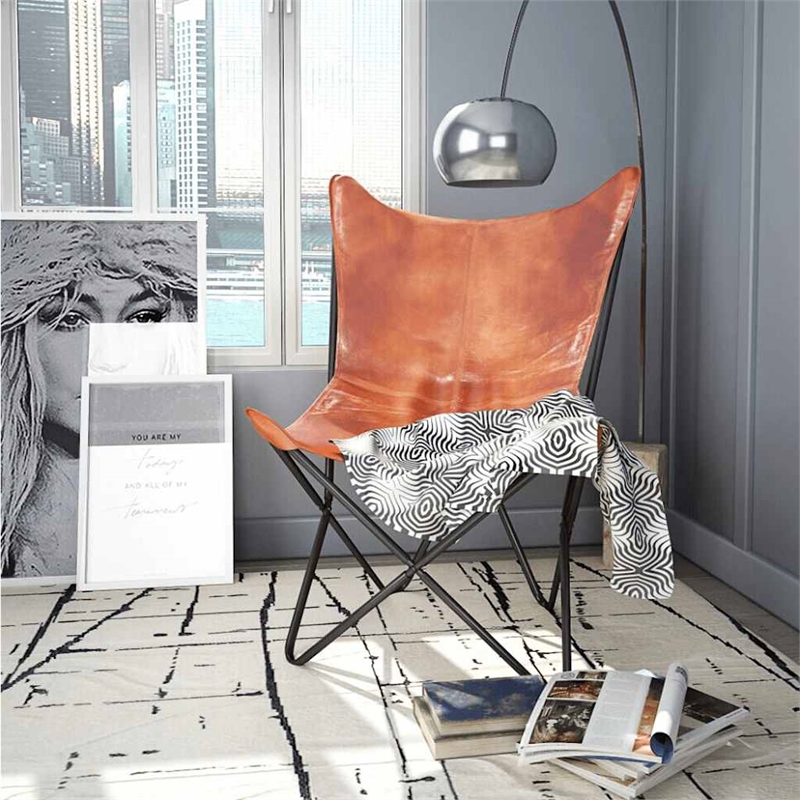 Bowery Hill Contemporary Real leather Butterfly Chair in Brown