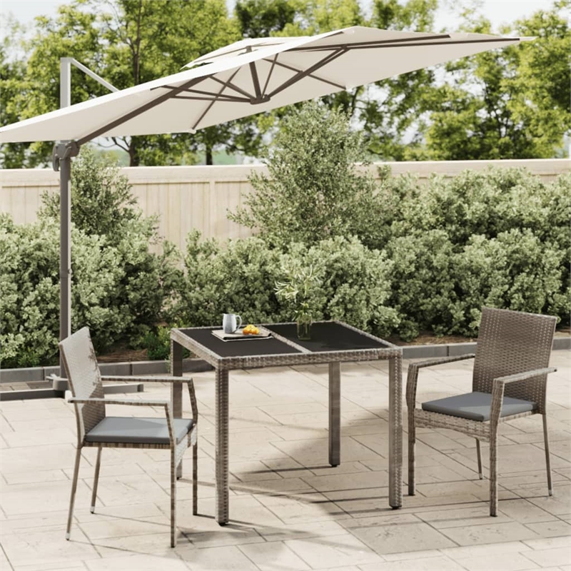 Bowery Hill PE Rattan and Tempered Glass Garden Dining Set in Gray