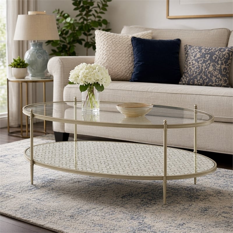 Bowery Hill Metal and Tempered Glass Oval Coffee Table in Silver
