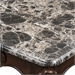 Bowery Hill Marble Rectangular End Table with Floral Legs in Cherry