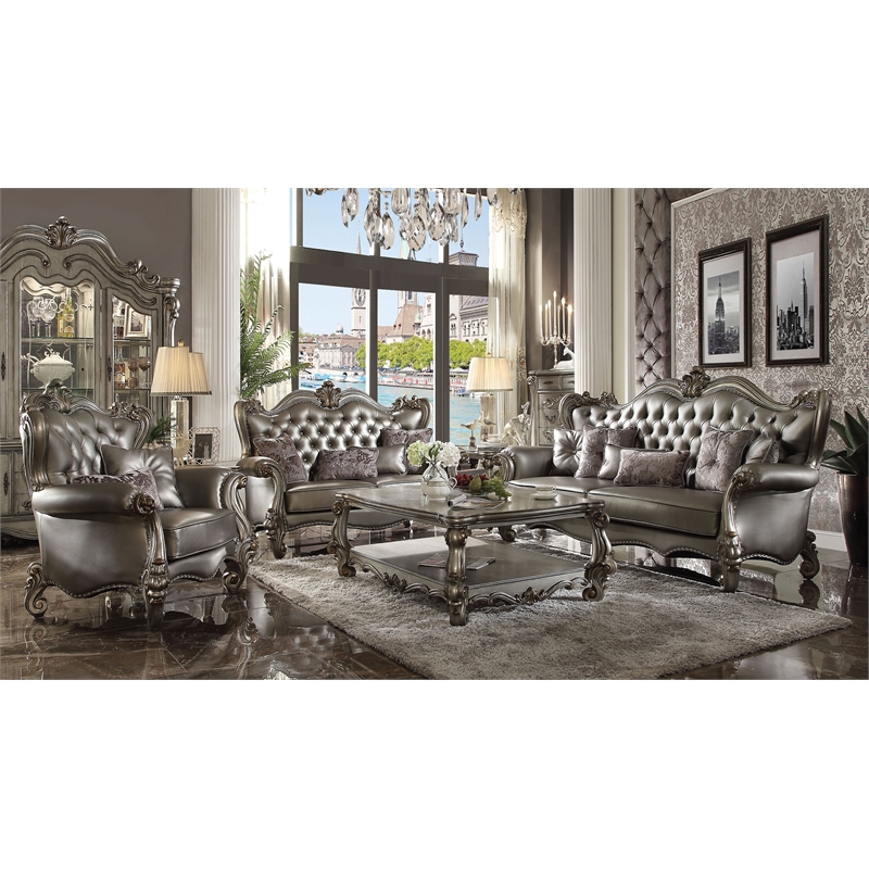 Bowery Hill Wing Back Chair in Silver Faux Leather with Antique Platinum Trim